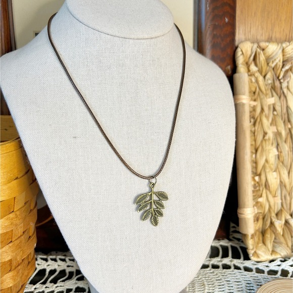 Antique Bronze Fern Pendant Necklace on Brown Rope Chain - Picture 1 of 6